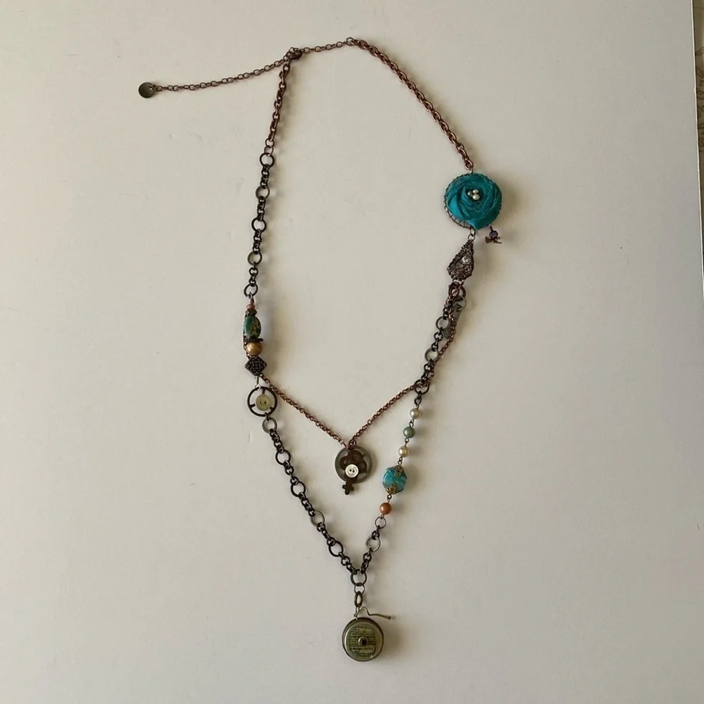 Costume jewelry necklace roses trinkets charms